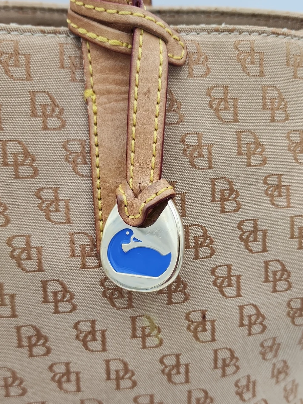 Dooney & Bourke Signature Monnogram Brown And Pink Satchel Bag‎